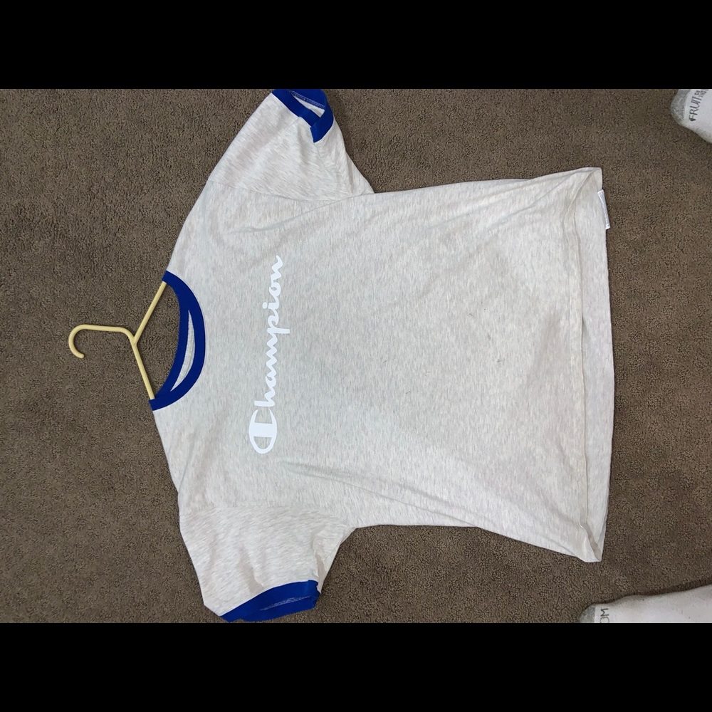 Grey Champion tee with blue lining.